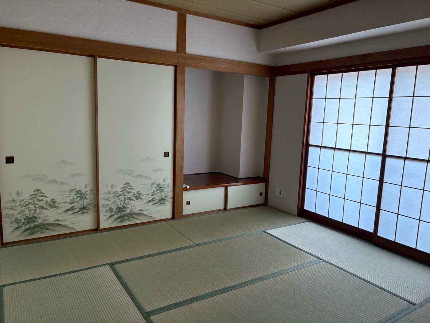 襖に山水画が描かれた和室(改装前)